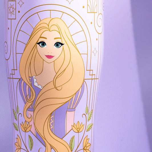 Rapunzel's Tumbler Cup featuring the Disney Princess on a lilac and floral background.